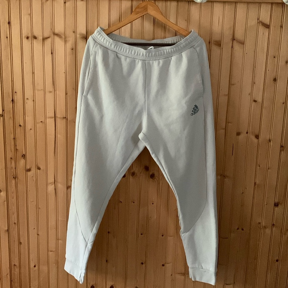 Mens adidas beige sweatpants.